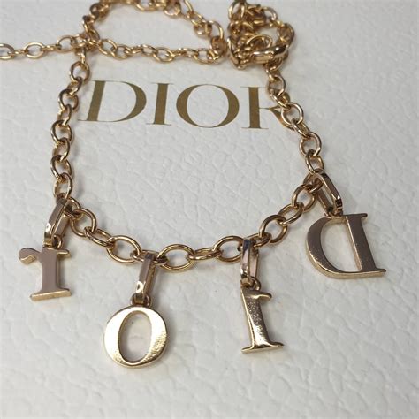 tell me dior necklace price|Dior letters necklace value.